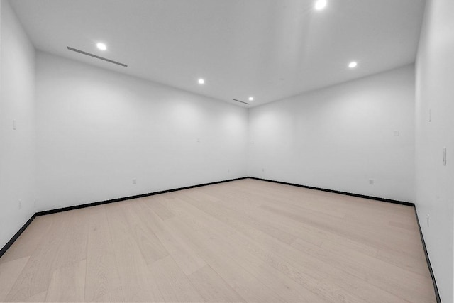 101 S Lake Hills Dr, Austin, TX 78733 - unfurnished room featuring recessed lighting and wood finished floors