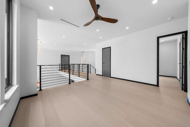 101 S Lake Hills Dr, Austin, TX 78733 - empty room featuring ceiling fan, light wood-type flooring, and recessed lighting