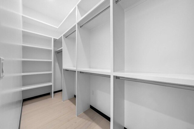 101 S Lake Hills Dr, Austin, TX 78733 - walk in closet featuring light wood-type flooring