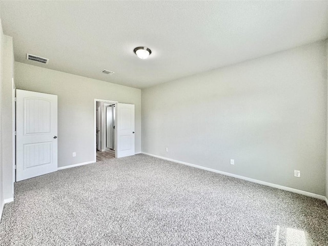 2721 Bridekirk Dr, Round Rock, TX 78664 - unfurnished bedroom featuring carpet floors and baseboards
