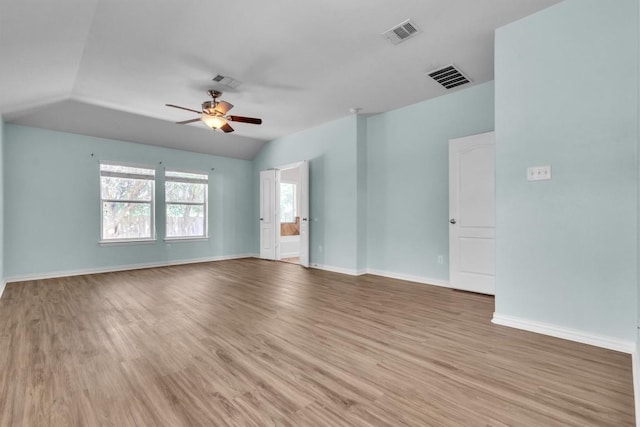 204 Chickadee Ln, Leander, TX 78641 - empty room featuring a ceiling fan, vaulted ceiling, light wood-type flooring, and baseboards