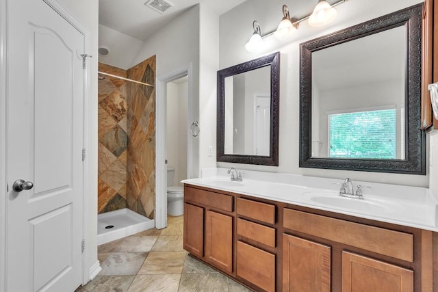 204 Chickadee Ln, Leander, TX 78641 - full bath featuring toilet, a shower stall, and double vanity