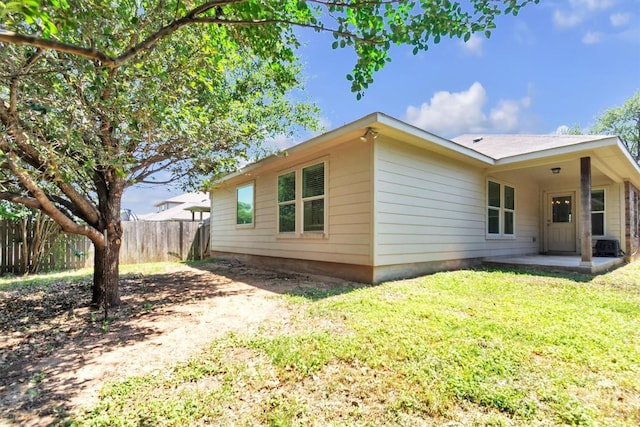 204 Chickadee Ln, Leander, TX 78641 - view of side of home with a patio area