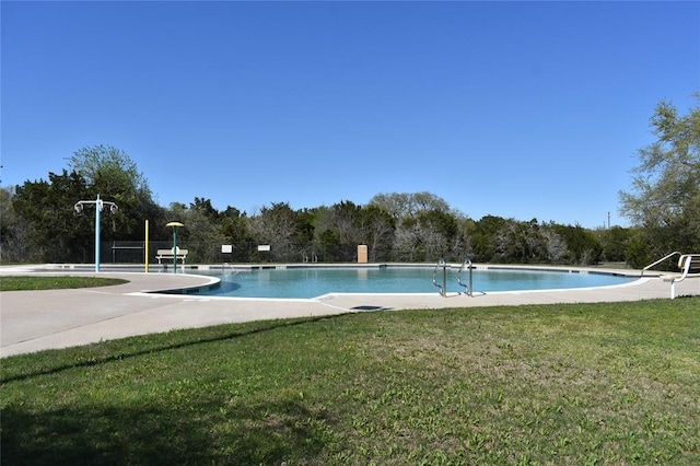 204 Chickadee Ln, Leander, TX 78641 - community pool featuring a lawn