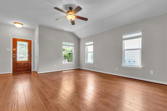 204 Chickadee Ln, Leander, TX 78641 - unfurnished room featuring vaulted ceiling, ceiling fan, wood finished floors, and baseboards