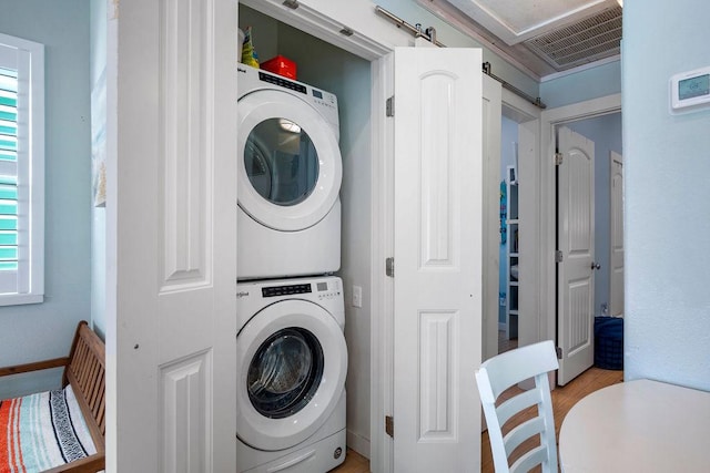 1924 S 11th St Unit 2, Port Aransas, TX 78373 - laundry area featuring estacked washer and dryer