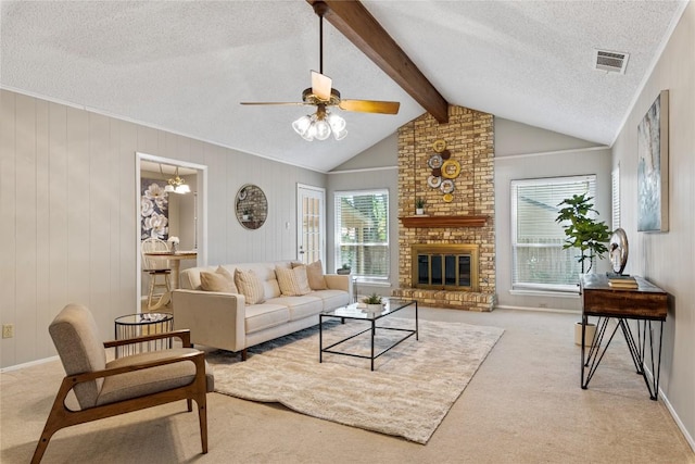 12701 Poquoson Dr, Austin, TX 78727 - carpeted living area featuring a textured ceiling, a ceiling fan, and a brick fireplace