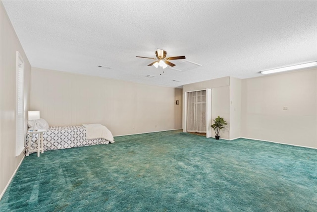 12701 Poquoson Dr, Austin, TX 78727 - carpeted empty room with ceiling fan and a textured ceiling