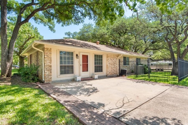 12701 Poquoson Dr, Austin, TX 78727 - view of front facade with brick siding
