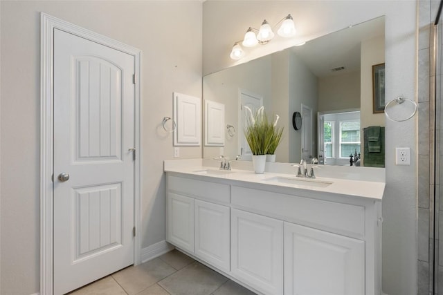213 Russet Trl, Georgetown, TX 78628 - full bathroom featuring double vanity, tile patterned floors, and baseboards