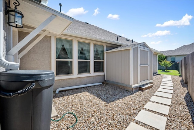 213 Russet Trl, Georgetown, TX 78628 - view of side of home with a fenced backyard and a shingled roof