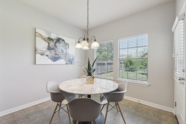 1207 Tricia Cv, Hutto, TX 78634 - dining space featuring plenty of natural light and a chandelier