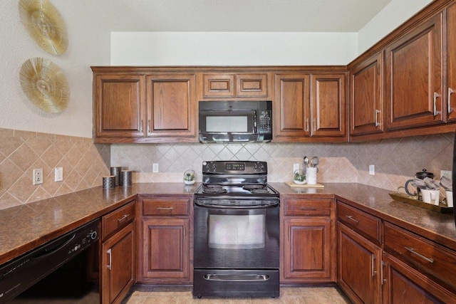 1207 Tricia Cv, Hutto, TX 78634 - kitchen featuring black appliances, tasteful backsplash, dark stone counters, and brown cabinets