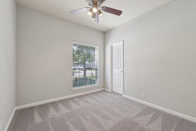 1207 Tricia Cv, Hutto, TX 78634 - carpeted spare room featuring ceiling fan and baseboards
