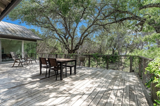 300 Summer Hills Dr, Wimberley, TX 78676 - wooden deck with outdoor dining area
