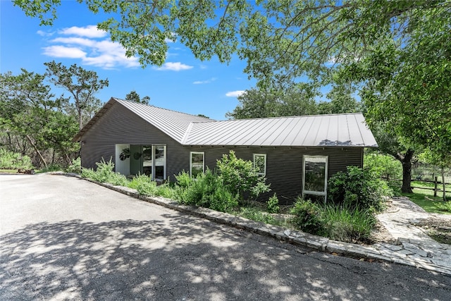 300 Summer Hills Dr, Wimberley, TX 78676 - view of front facade with a standing seam roof and metal roof