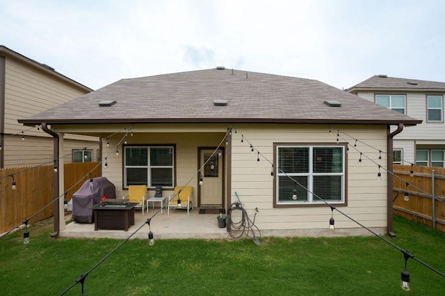421 Perfect World Loop, Jarrell, TX 76537 - back of property featuring a patio area, a fenced backyard, and roof with shingles