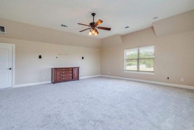 421 Huck Finn Trl, Dripping Springs, TX 78620 - empty room featuring a ceiling fan, baseboards, light carpet, and lofted ceiling