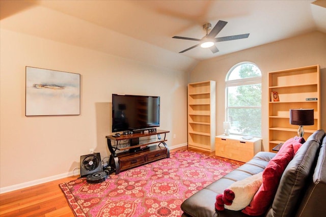 9508 Bully Hill Cv, Austin, TX 78759 - living room with lofted ceiling, wood finished floors, and a ceiling fan