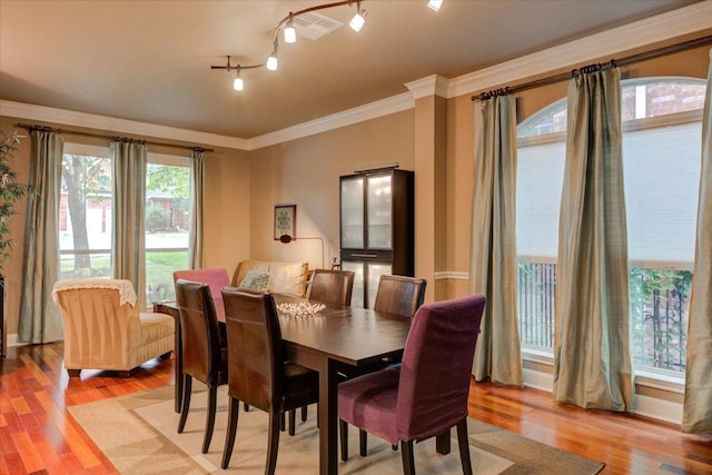 9508 Bully Hill Cv, Austin, TX 78759 - dining room featuring crown molding and light wood-style floors