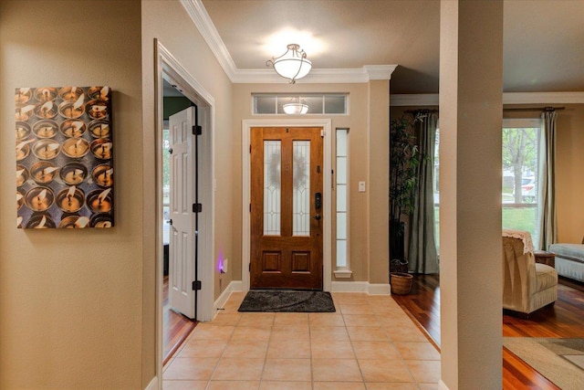 9508 Bully Hill Cv, Austin, TX 78759 - entryway with crown molding and light wood finished floors