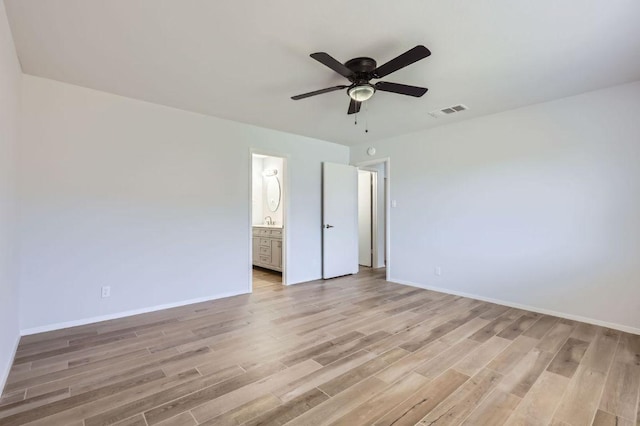 11306 Thorny Brook Trl, Austin, TX 78750 - spare room featuring light wood finished floors, ceiling fan, and baseboards