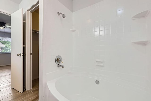 11306 Thorny Brook Trl, Austin, TX 78750 - bathroom with wood finished floors, shower / tub combination, and ceiling fan