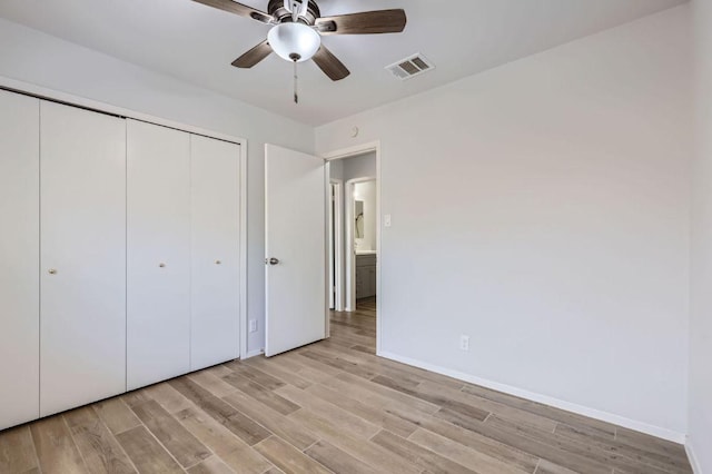11306 Thorny Brook Trl, Austin, TX 78750 - unfurnished bedroom with light wood-type flooring, baseboards, a closet, and ceiling fan