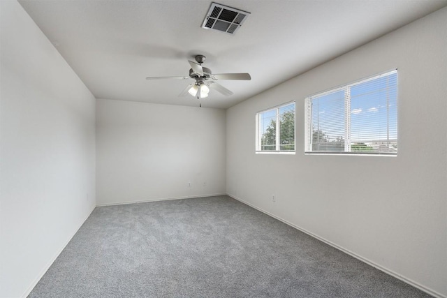 7432 Cayenne Ln, Austin, TX 78741 - spare room with carpet flooring, ceiling fan, and baseboards