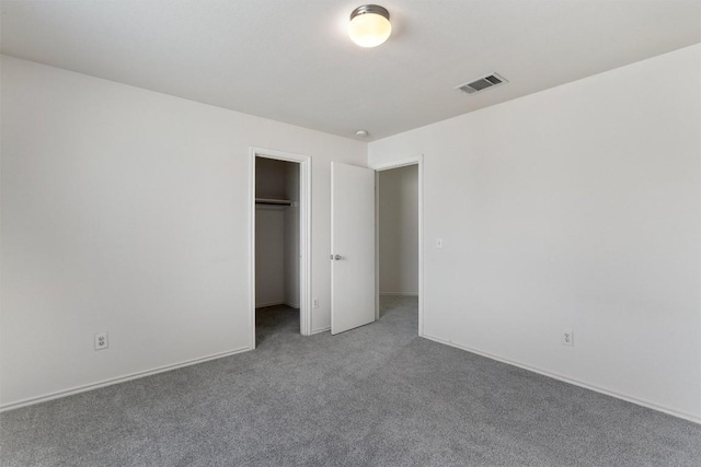 7432 Cayenne Ln, Austin, TX 78741 - unfurnished bedroom with carpet, a closet, and baseboards