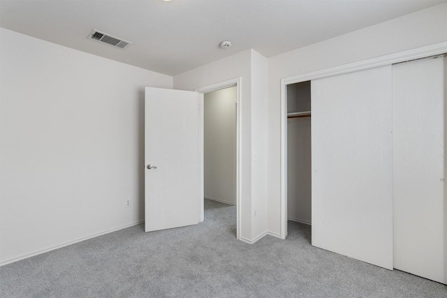 7432 Cayenne Ln, Austin, TX 78741 - unfurnished bedroom featuring carpet flooring and a closet