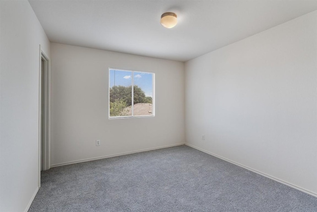 7432 Cayenne Ln, Austin, TX 78741 - spare room with carpet floors and baseboards