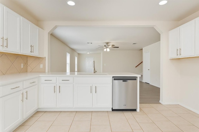 7432 Cayenne Ln, Austin, TX 78741 - kitchen with dishwasher, a sink, a peninsula, ceiling fan, and recessed lighting