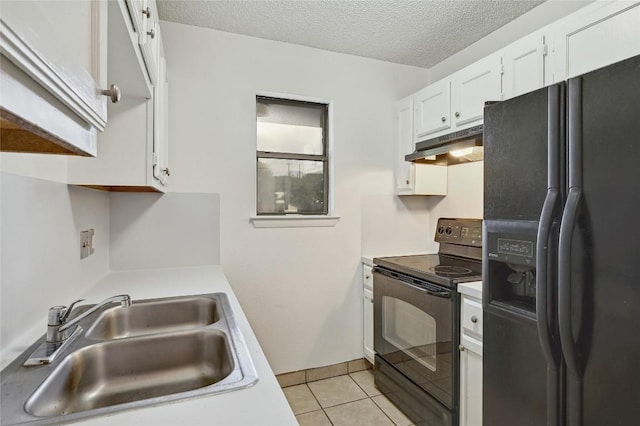 4307 S 1st St Unit 104, Austin, TX 78745 - kitchen featuring fridge with ice dispenser, electric range, under cabinet range hood, light countertops, and a textured ceiling