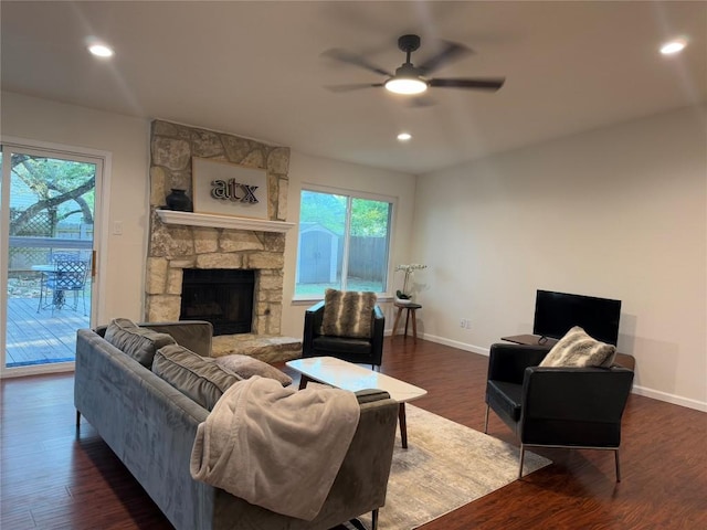 12225 Mosley Ln, Austin, TX 78727 - living area featuring ceiling fan, dark wood-style flooring, baseboards, a fireplace, and recessed lighting