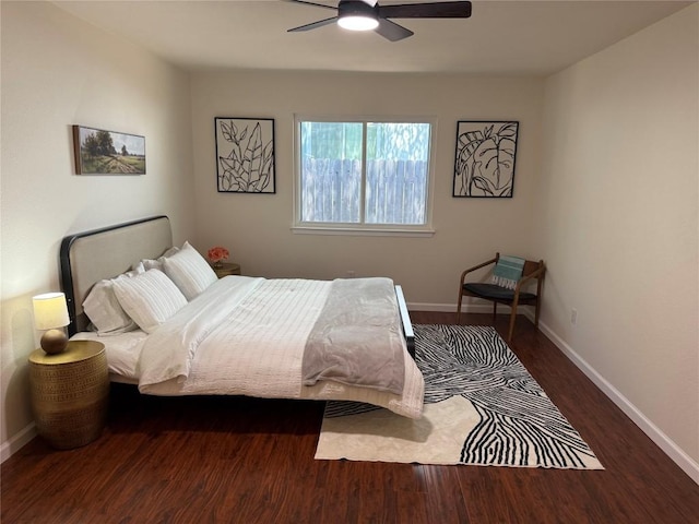12225 Mosley Ln, Austin, TX 78727 - bedroom with wood finished floors, baseboards, and a ceiling fan