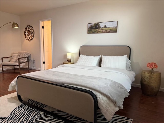12225 Mosley Ln, Austin, TX 78727 - bedroom featuring wood finished floors and baseboards