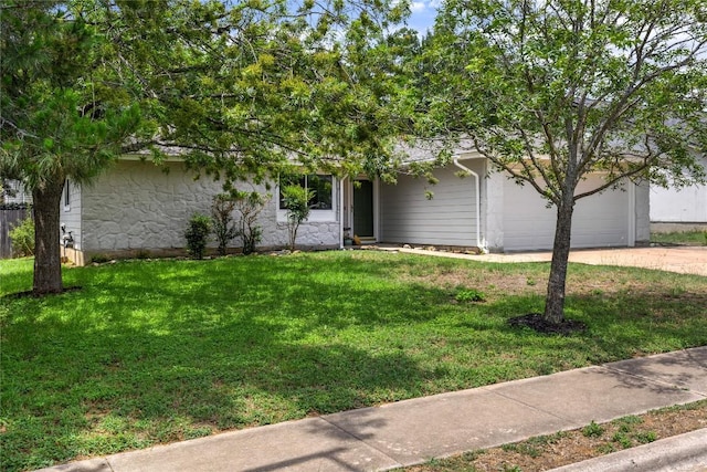 12225 Mosley Ln, Austin, TX 78727 - obstructed view of property with an attached garage, concrete driveway, and a front yard