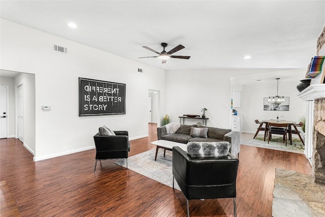 12225 Mosley Ln, Austin, TX 78727 - living room with ceiling fan, dark wood finished floors, a chandelier, and recessed lighting