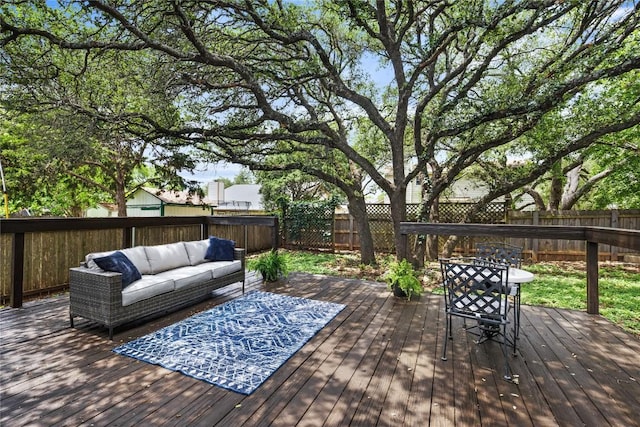 12225 Mosley Ln, Austin, TX 78727 - wooden terrace with outdoor lounge area and a fenced backyard