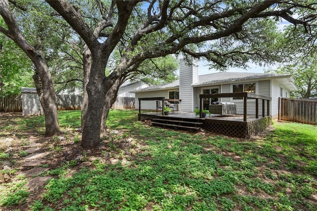 12225 Mosley Ln, Austin, TX 78727 - fenced backyard featuring a deck