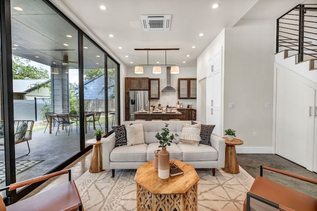 803 Josephine St, Austin, TX 78704 - living room with recessed lighting, baseboards, and stairs