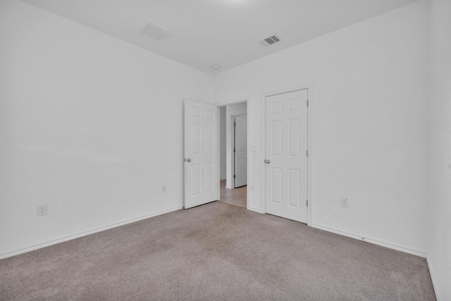 13013 Titanium St, Austin, TX 78754 - spare room featuring carpet flooring and baseboards
