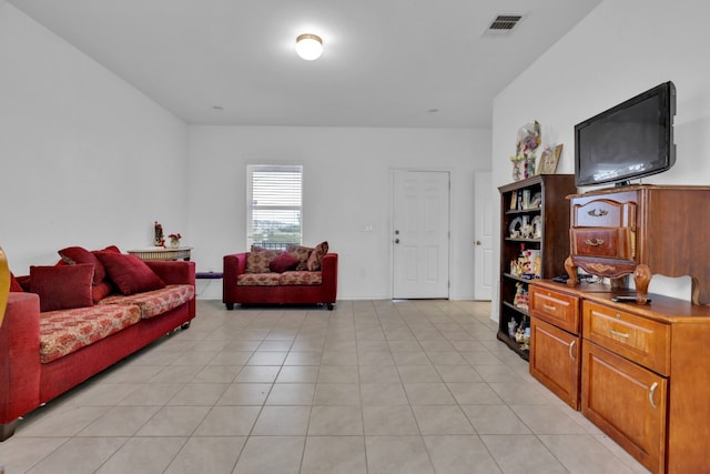 13013 Titanium St, Austin, TX 78754 - living room featuring light tile patterned floors