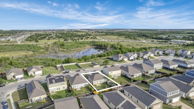 13013 Titanium St, Austin, TX 78754 - aerial view of residential area featuring a nearby body of water and property parcel outlined