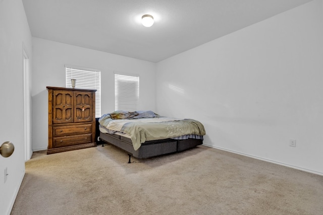 13013 Titanium St, Austin, TX 78754 - bedroom featuring carpet floors and baseboards