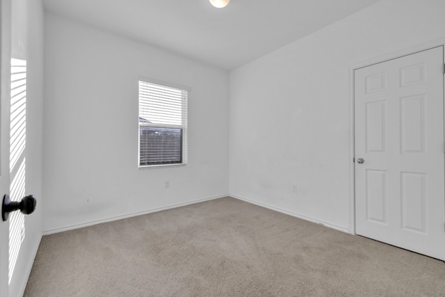 13013 Titanium St, Austin, TX 78754 - carpeted spare room with baseboards