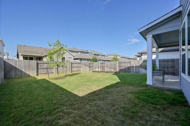 8513 Cottage Rose Dr, Austin, TX 78744 - view of yard featuring a residential view and a patio