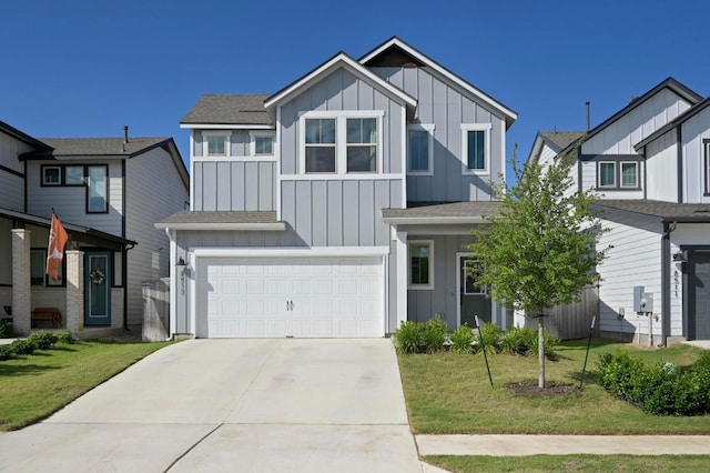 8513 Cottage Rose Dr, Austin, TX 78744 - view of front of property featuring board and batten siding, an attached garage, concrete driveway, roof with shingles, and a front yard