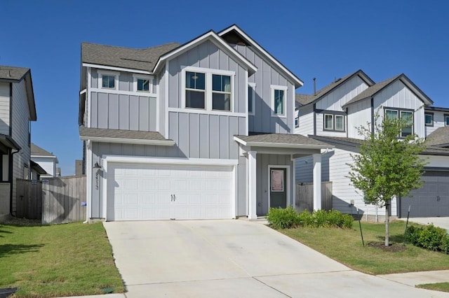 8513 Cottage Rose Dr, Austin, TX 78744 - view of front of house with board and batten siding, a garage, driveway, and a shingled roof